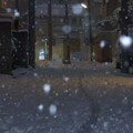 降雪越しの近所の夕景